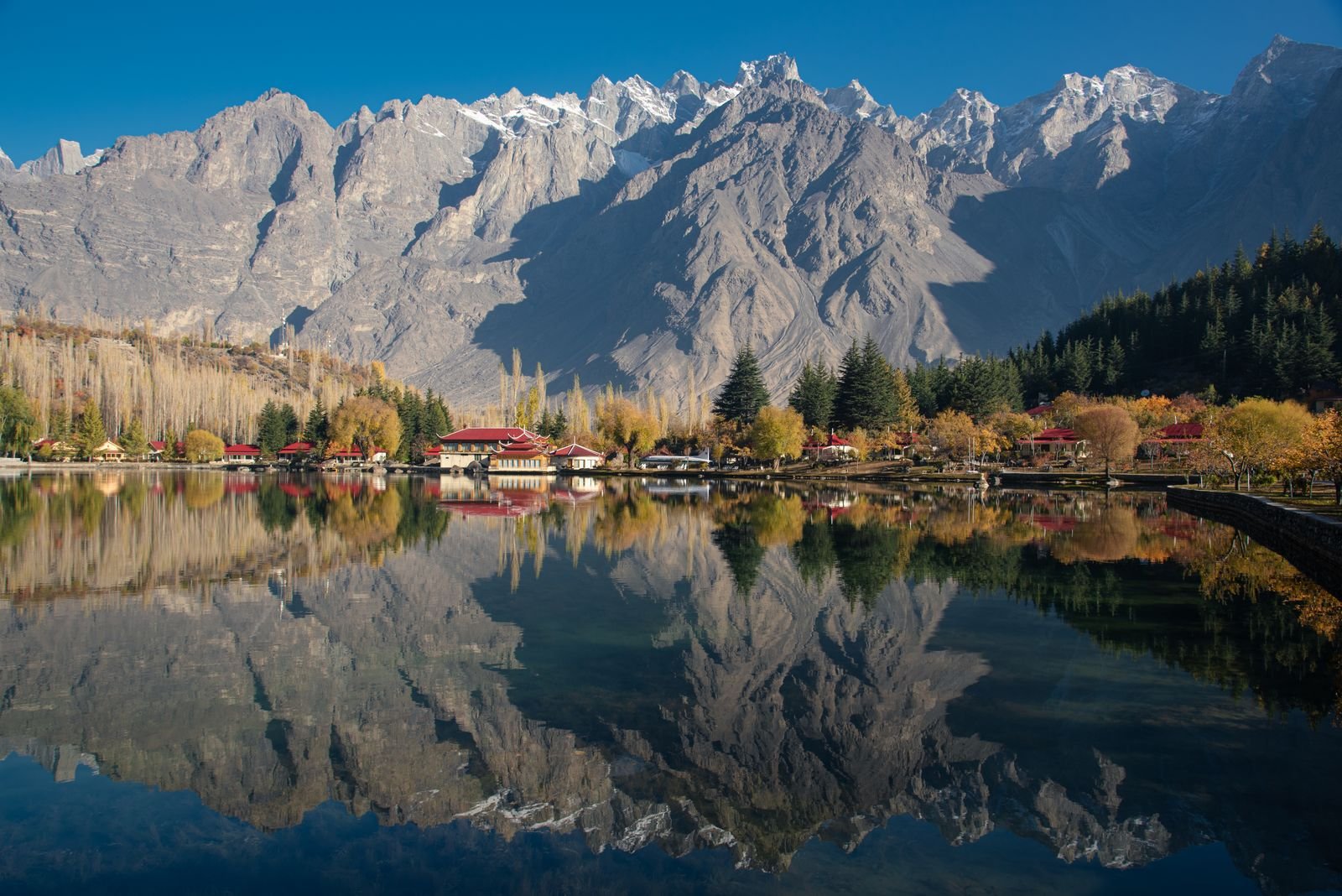 Mountain reflections and autumn scenery at Shangrila Lake, Skardu, Pakistan.